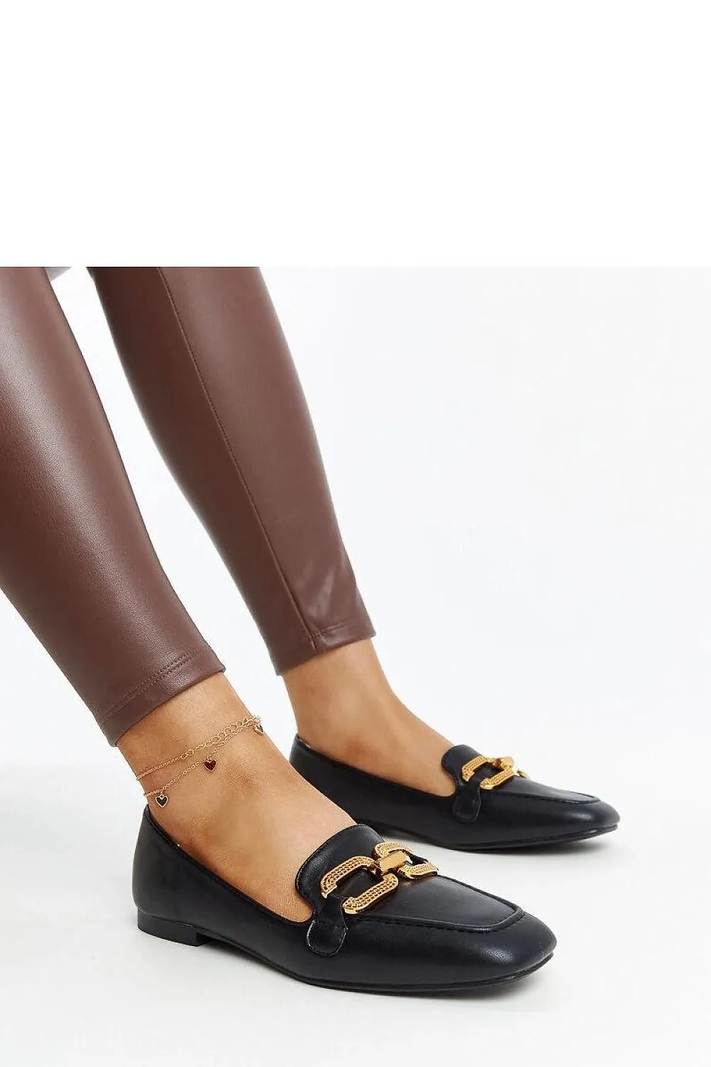 Black moccasins with a buckle