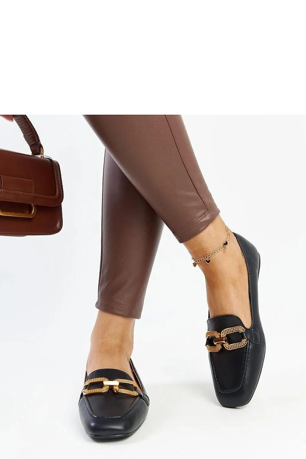 Black moccasins with a buckle