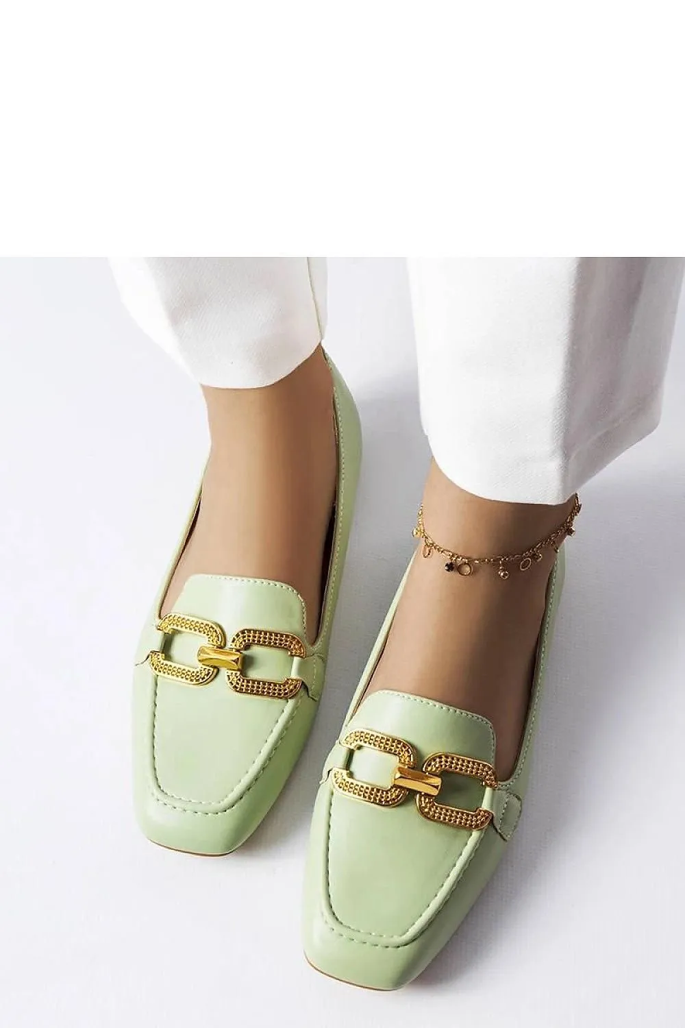Black moccasins with a buckle