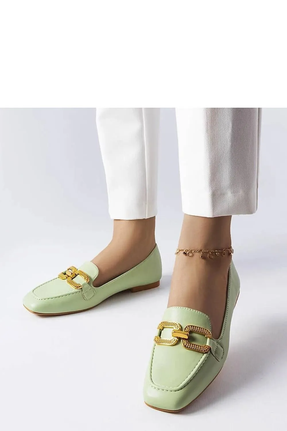 Black moccasins with a buckle